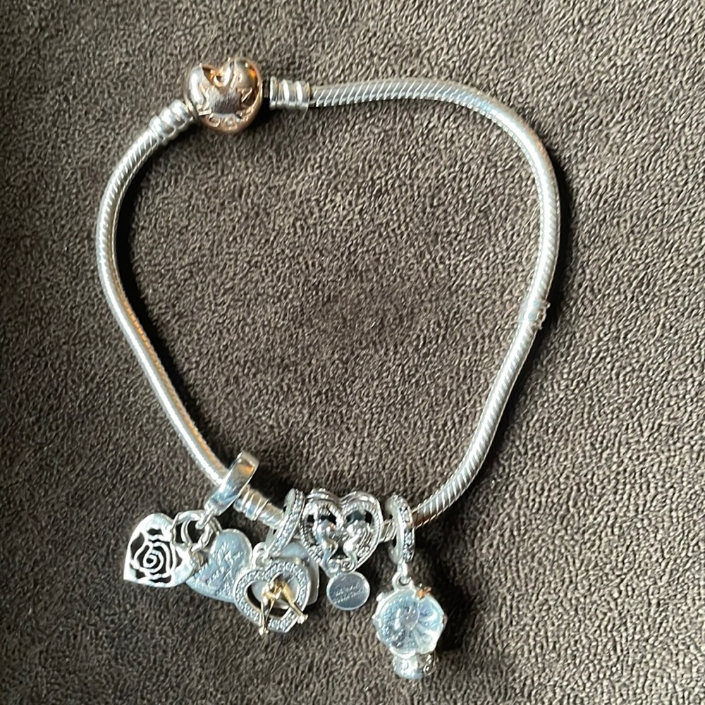 Authentic Pandora bracelet & Pandora charms with a rose gold clasp